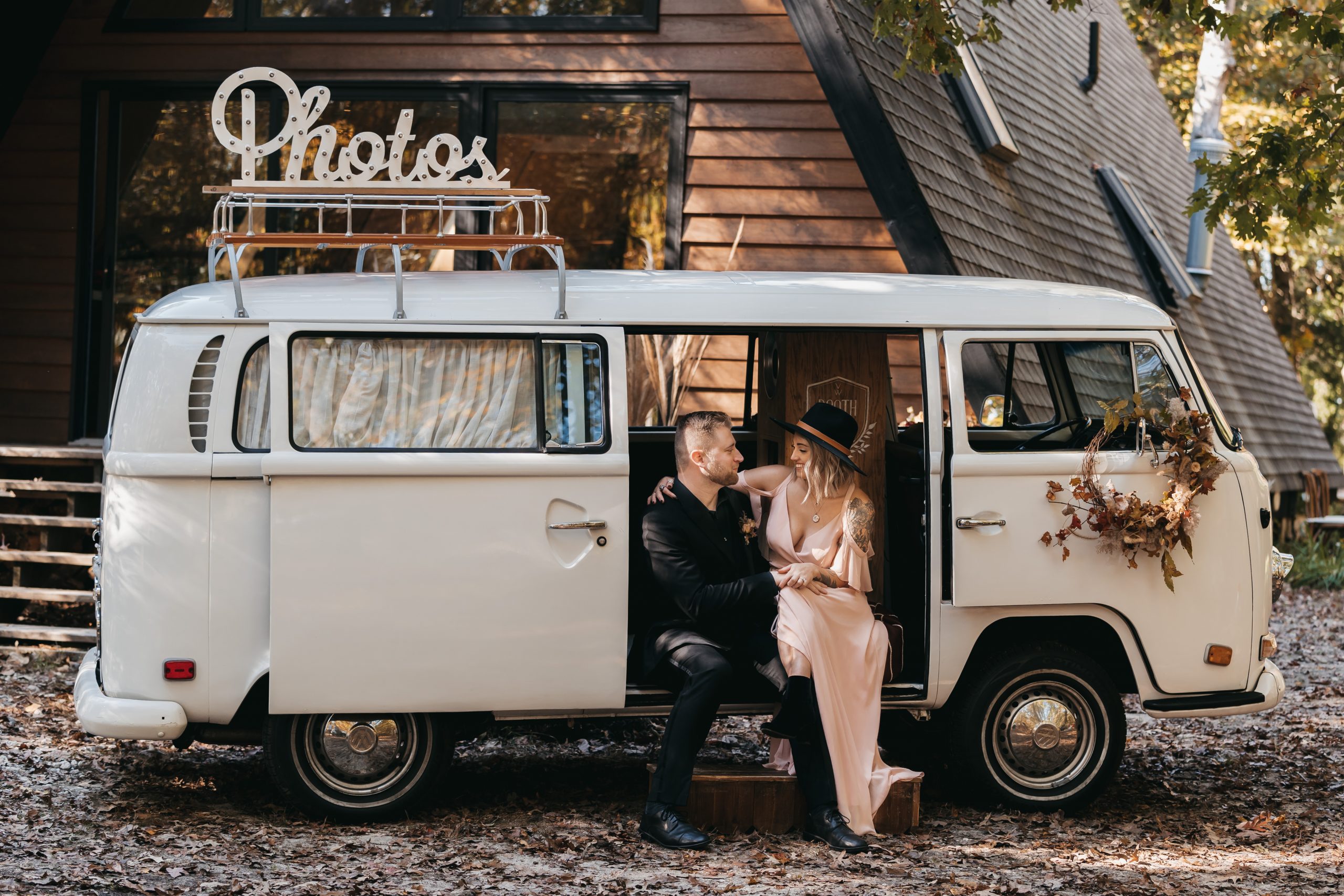 Couple sits in cute VW van during their Boulder elopement 