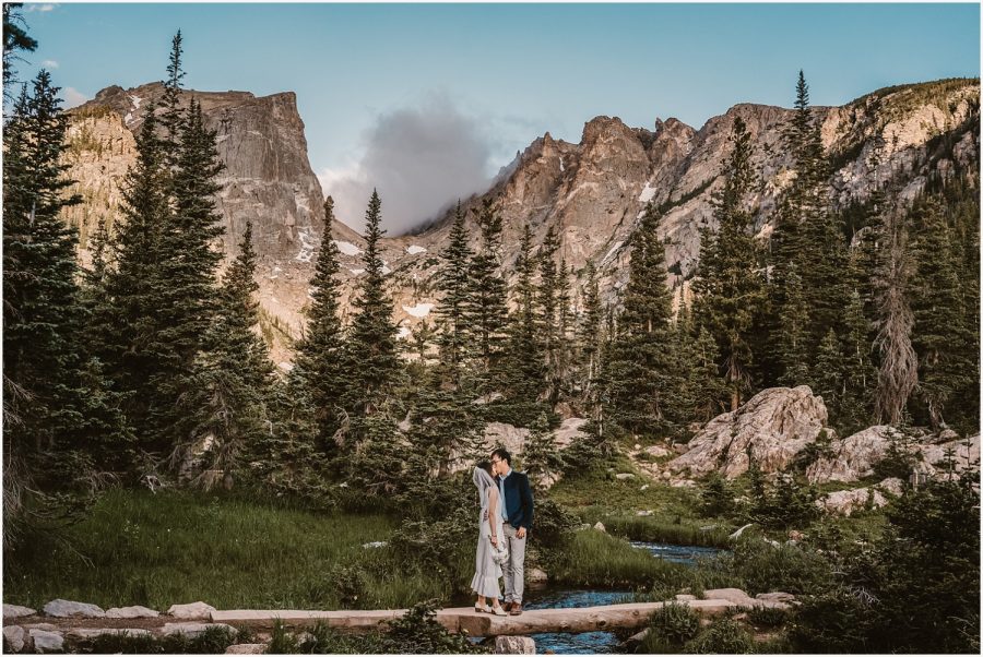 Rocky Mountain National Park Elopement Guide Couple kissing by Dream Lake