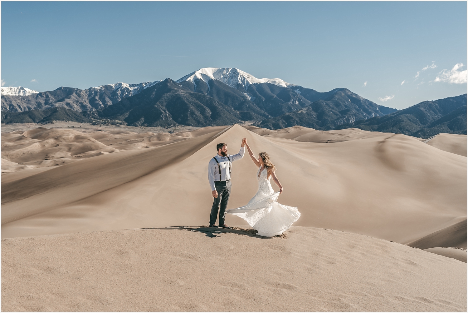 Wedding couple dancing at the Sand Dunes National Park