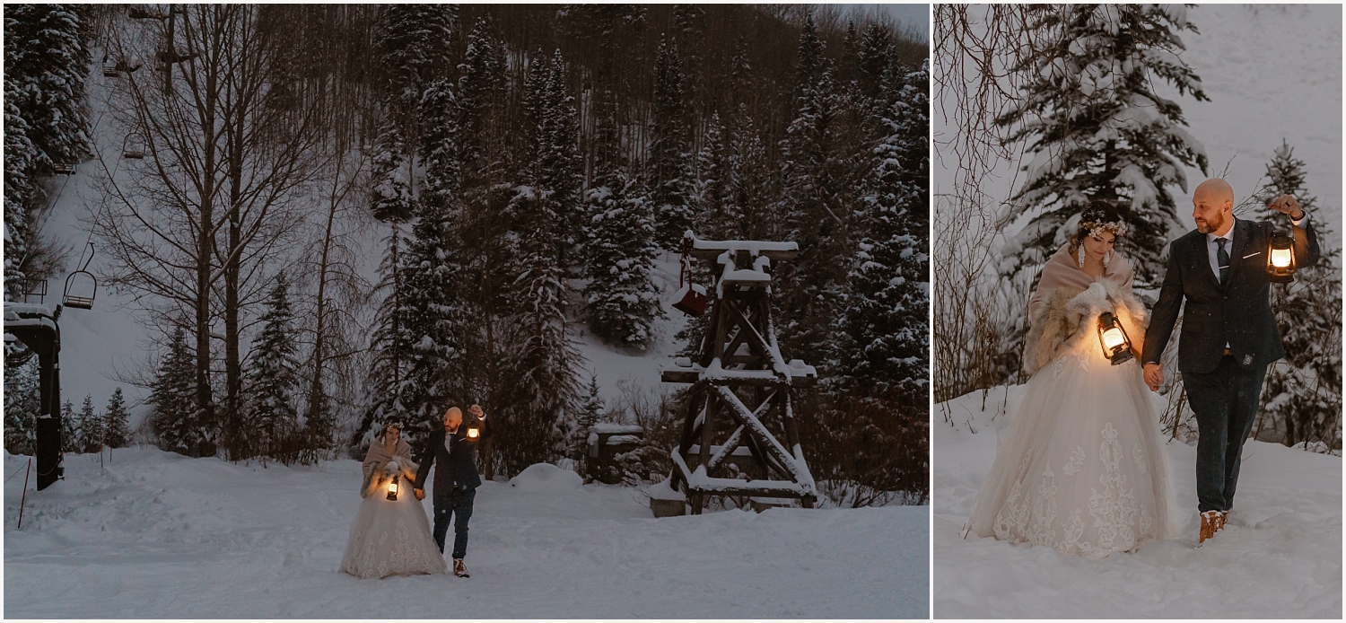 Couple holds lanterns during their winter elopement