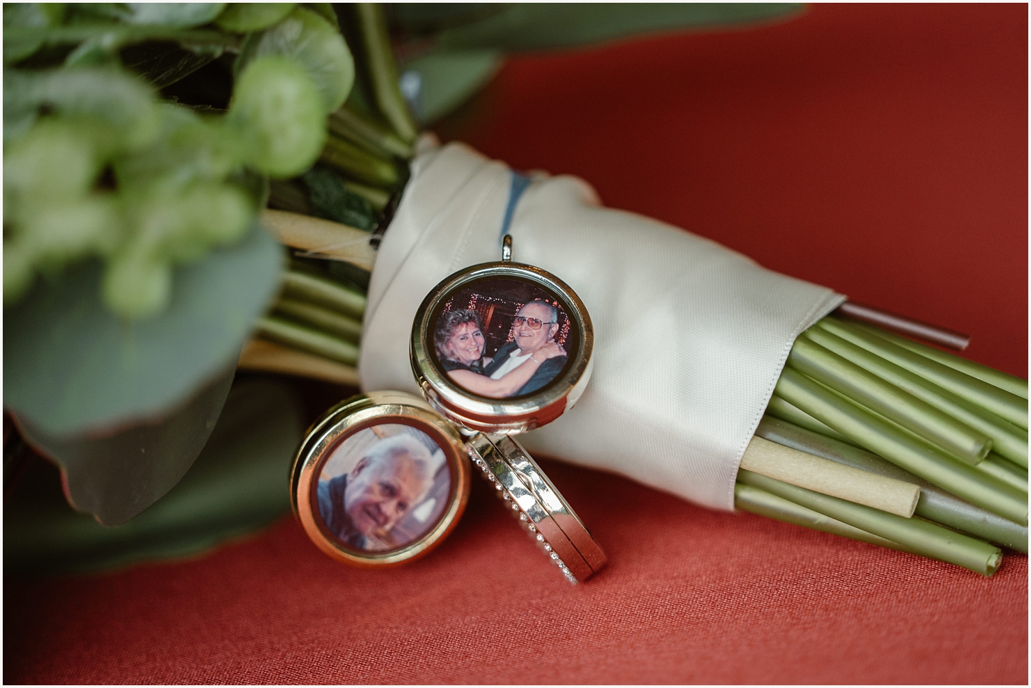 Charms on wedding bouquet with photos of loved ones