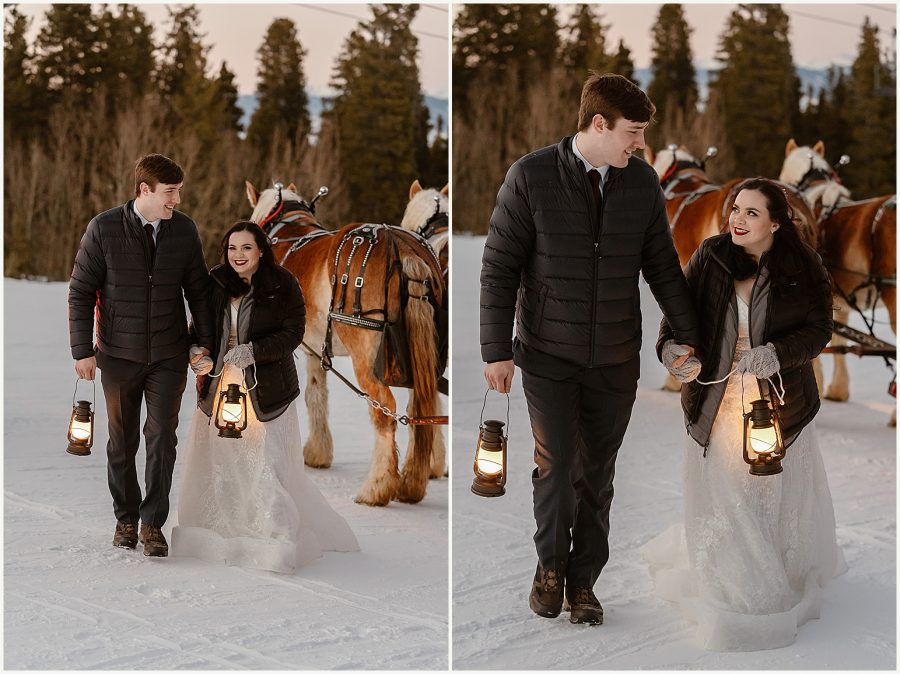 Holding lanterns, a bride and groom explore a Breckenridge peak at dusk during their Breckenridge winter elopement. 