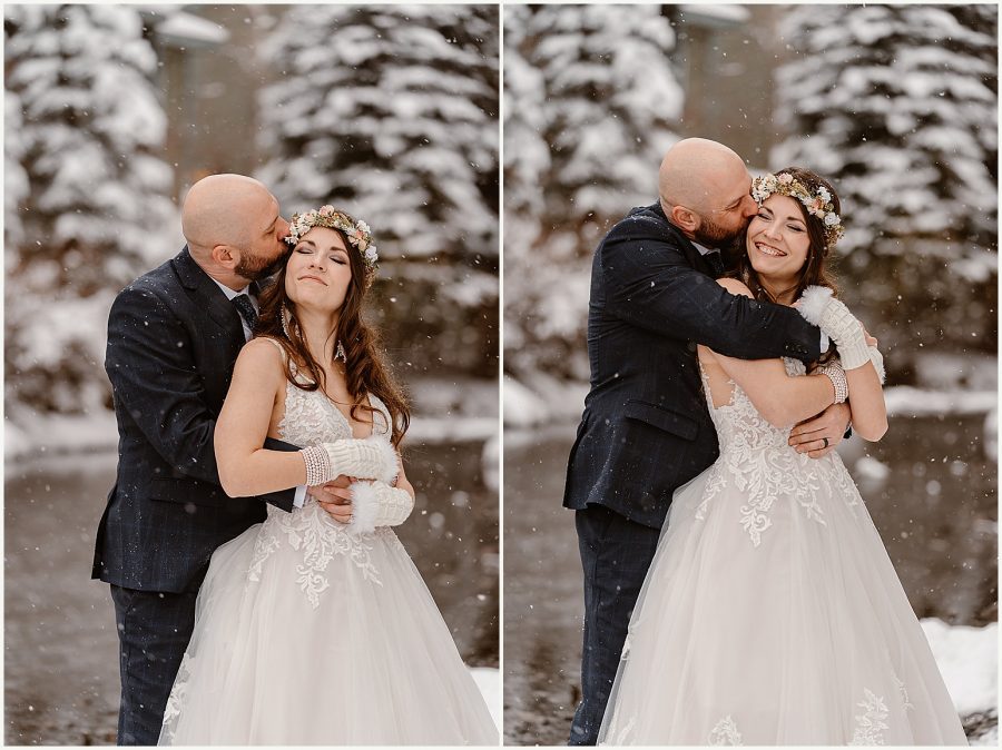 A couple holds each other close during their winter Telluride elopement in the snow.