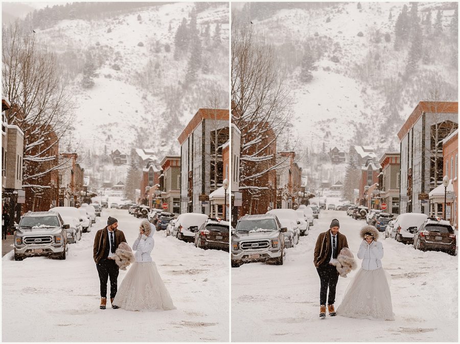 A bride and groom explore the snowy streets of Telluride during their winter Telluride elopement. 