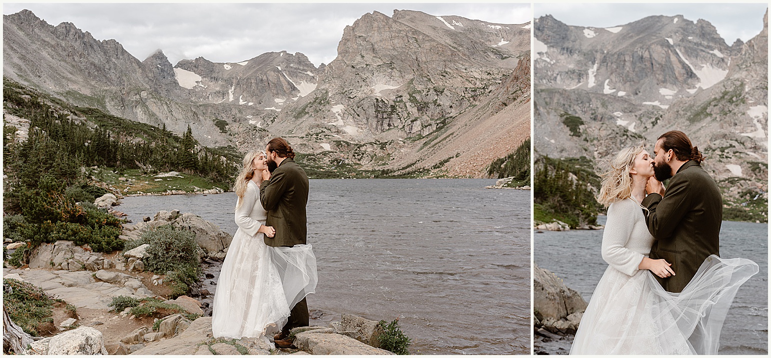 A couple kisses each other after their adventure elopement ceremony in a beautiful spot in Colorado. 
