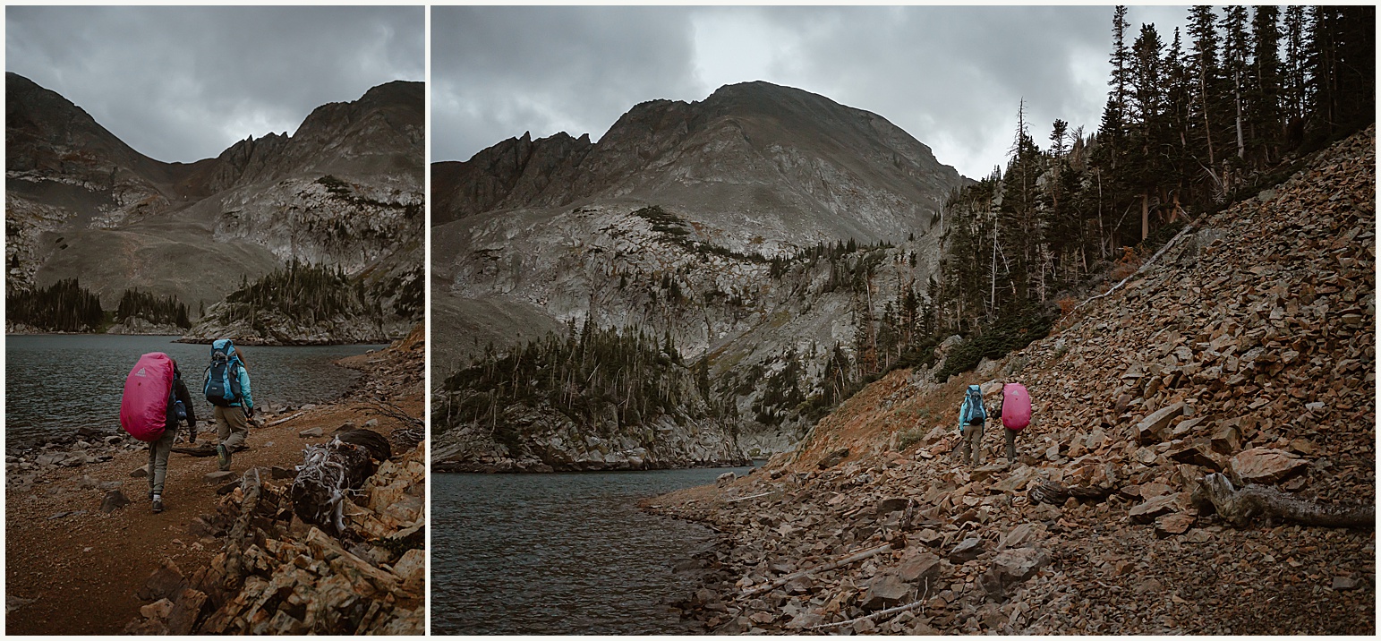 Two brides hike up a mountain to catch a sunrise for their Colorado elopement.