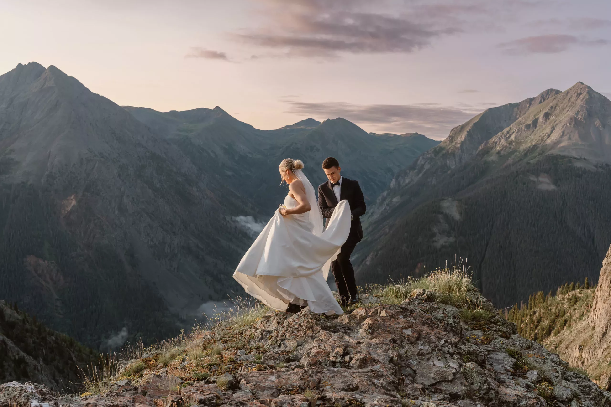 A couple hikes around a gorgeous spot in the San Juan mountains on their elopement day.