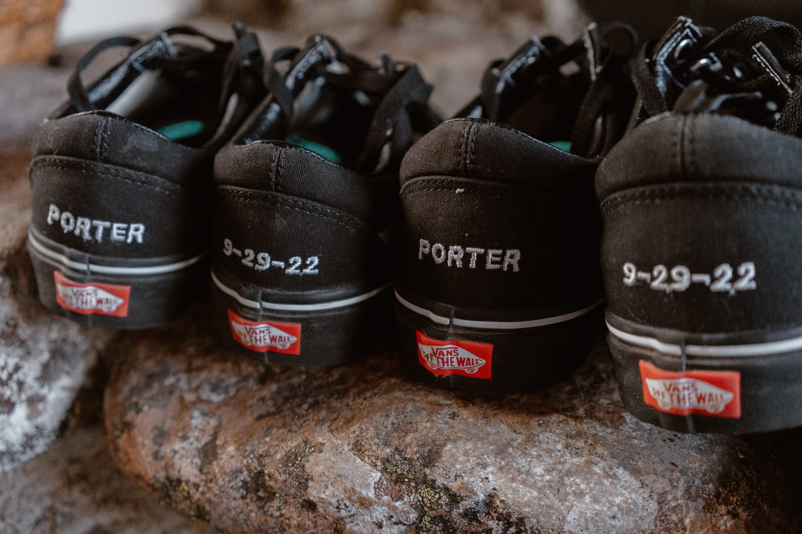 This lineup shows a family's shoes, a detail during their Colorado waterfall elopement. 