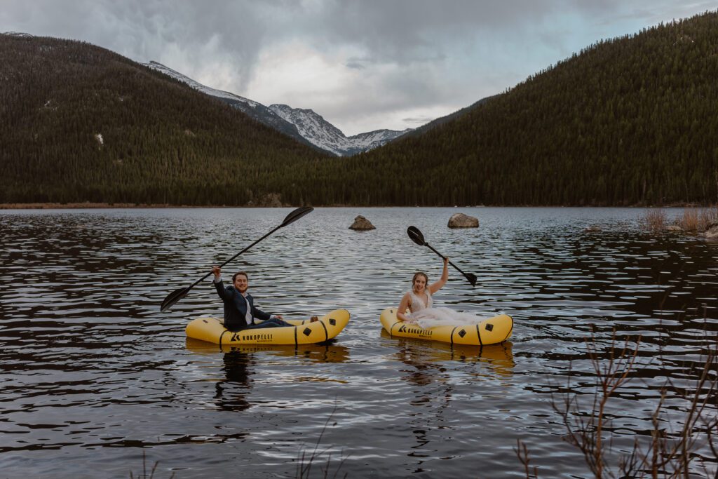 A bride and groom celebrate their elopement during their rafting elopement ceremony.