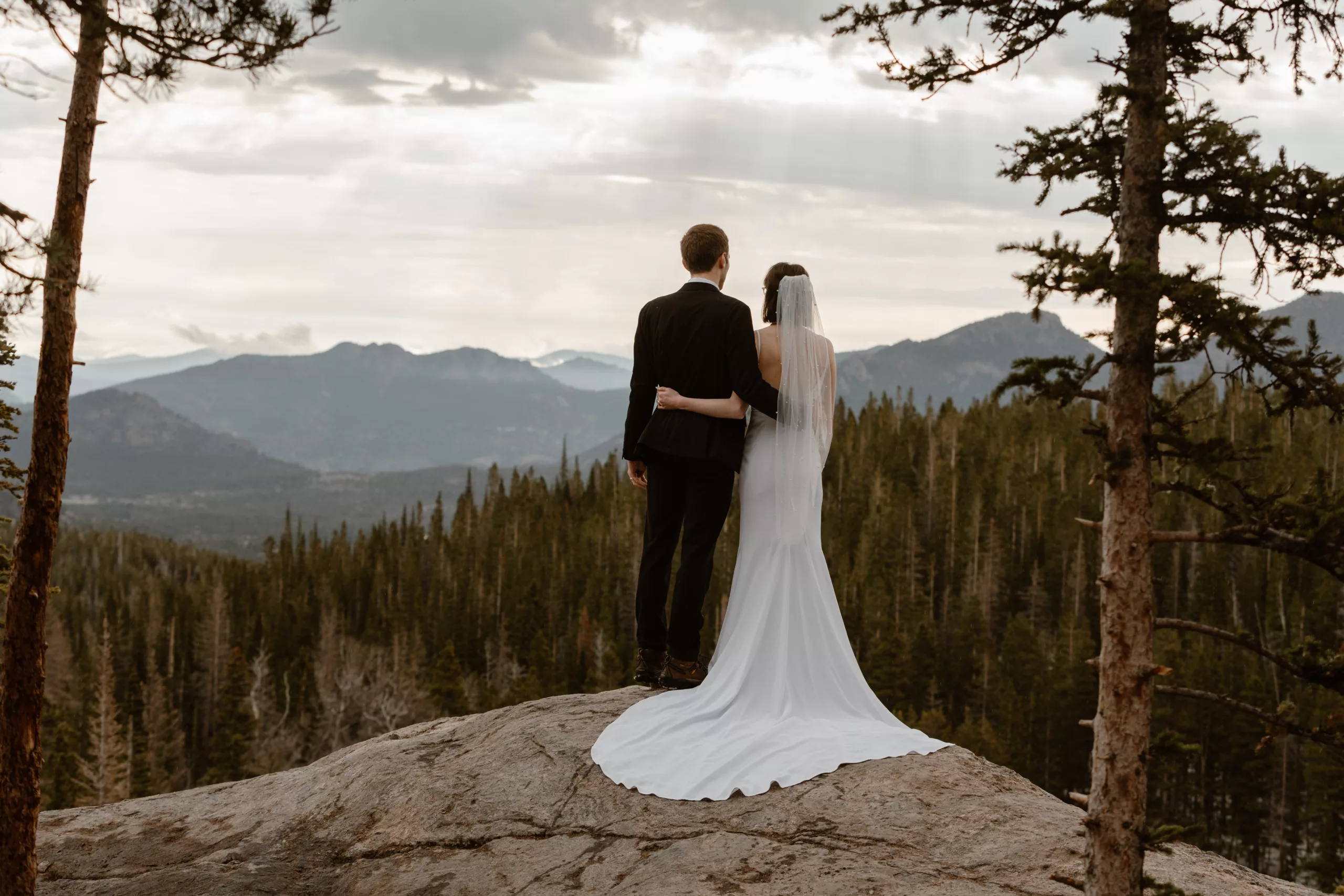 A couple enjoys their adventure elopement in Colorado, never stressing about the extra time spent because they booked extra coverage for their elopement day.