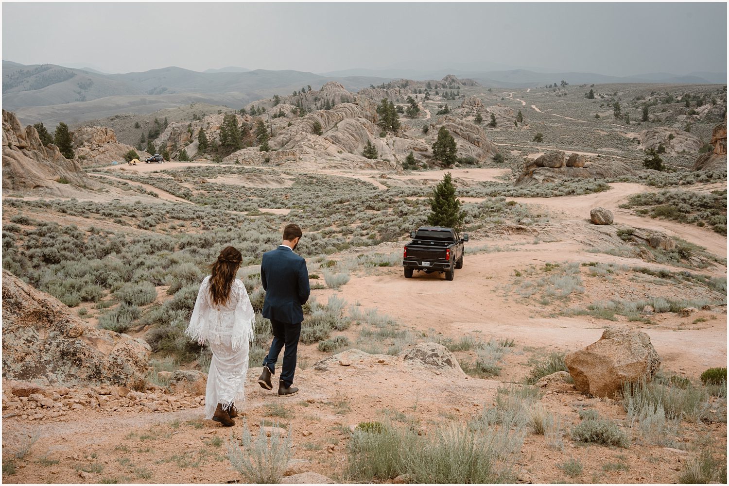 4x4 vehicle parked on a dirt road in the mountains for a couple planning an off-roading elopement.