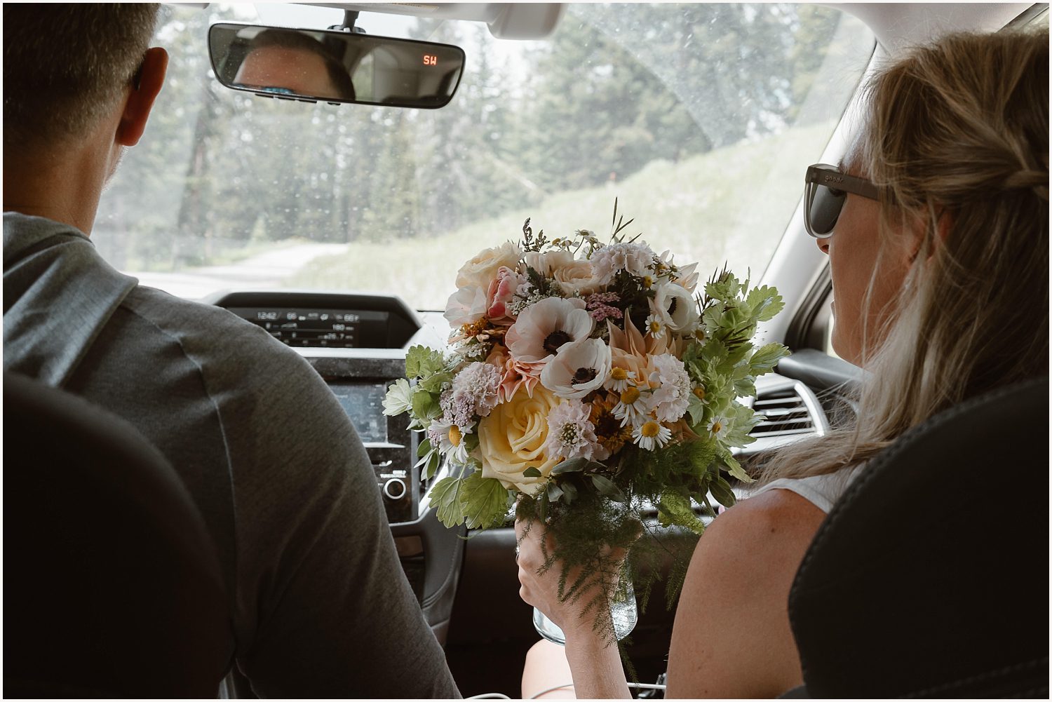 Couple exploring a rocky trail together while on their off-roading elopement.