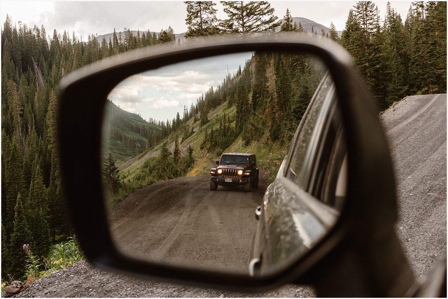 Adventure-loving couple celebrating amidst nature as they plan their off-roading elopement together.